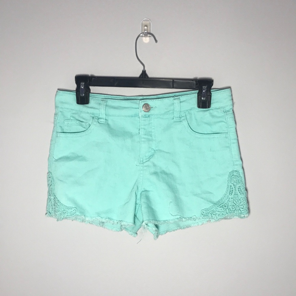 kids teal jean shorts with lace design on side